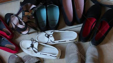 Women`s shoes are placed on the floor, close-up