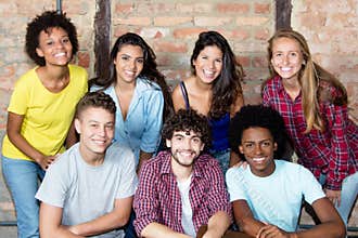 Large group of multi ethnic young adult people