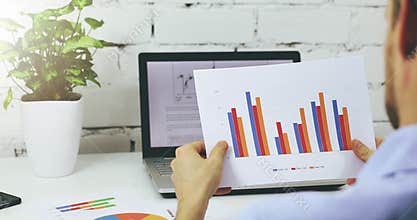 Businessman analyzing business financial reports