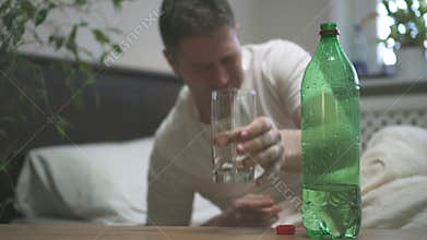 Man drinking mineral water.