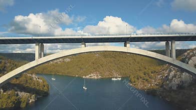 Aerial panorama view with bridge and sea around islands. Beautiful landscape surrounded with blue sea with bridge.