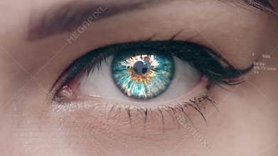 Digital composite of blinking eye with tech interface