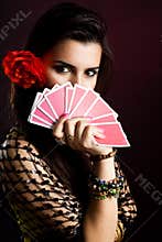 Gypsy woman with fan of cards