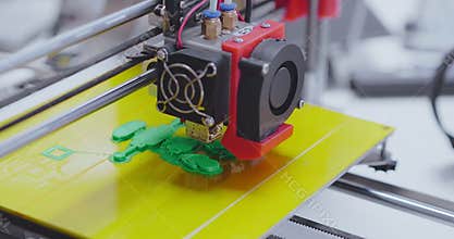 3d printer in process of creating mini robot