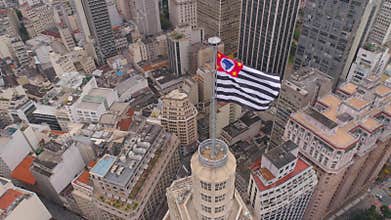 SAO PAULO, BRAZIL - MAY 3, 2018: Aerial View of the city centre Banespa building with city flag