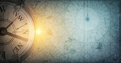 Old sea compass on abstract map background. Pirate and nautical