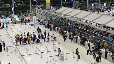 Time lapse of passengers wait at the check in queue in departure terminal