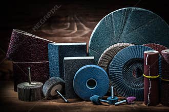 Abrasives on vintage wood background