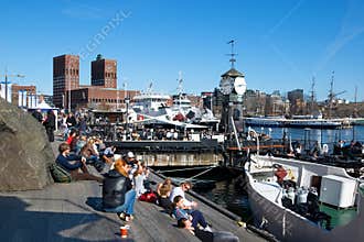 Norway. Oslo. People on embankment