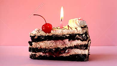 Biscuit basket with white pastry cream, red cocktail cherry and one burning birthday candle on the top. Time lapse video