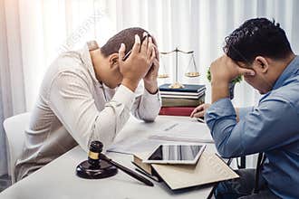 Business man sit strain serious for problem of contract  insurance with lawyers in office. justice and law ,attorney, court judge
