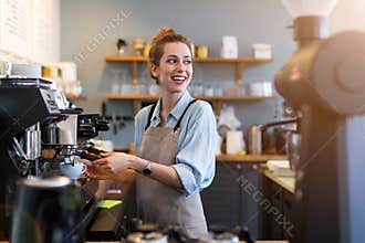 Female barista making coffee