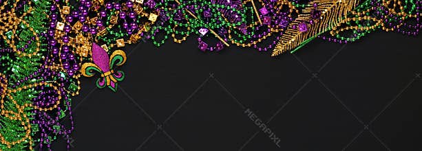 Purple, Gold, and Green Mardi Gras beads and decorations