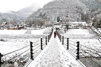 The suspended bridge entrance of Shirakawago in winter, Japan