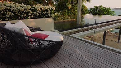 Outdoor Rattan Wicker Pation Day Bed on Luxury Terrace with Swimming Pool and Sea View