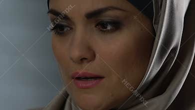 Melancholic muslim woman crying, family problems and despair, abused female