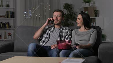 Couple suffering power outage claiming on phone