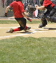 Little league play at homeplate