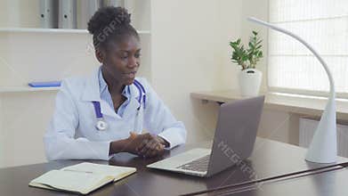 Lady md using voip for counseling