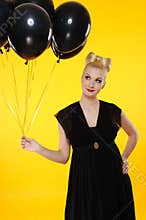 Lady with black balloons