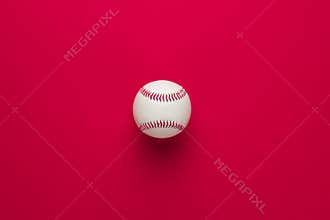 Baseball ball on red