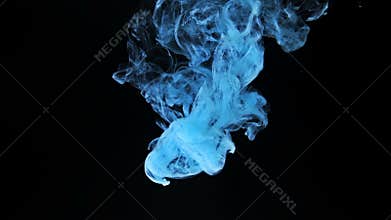 Cyan ink splash on black background
