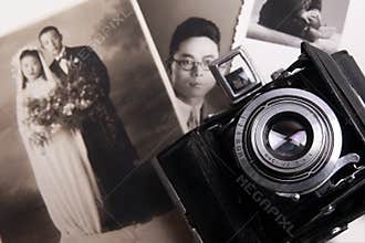 Old camera and old photo