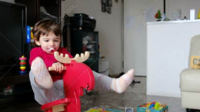 Baby ride rocking deer horse swing reindeer dressed red for christmas