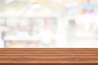 Empty wood table top on white blurred background,for montage you