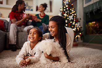 Afro-American child for Christmas eve with family at home