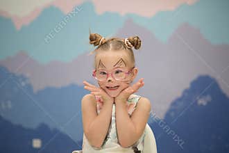 Beautiful girl with a Down syndrome with aqua-grams