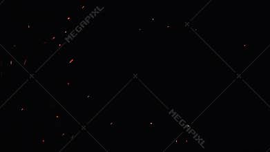 Ultra slow motion shot of fire flames and glowing ashes on black background