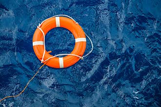Safety equipment, Life buoy or rescue buoy floating on sea to rescue people from drowning man