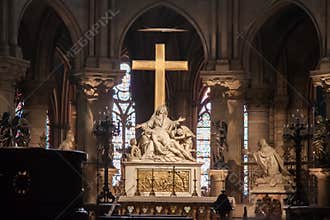 The Descent from the Cross or Pieta statue by Nicolas CoustouÂ in the choir of Notre-Dame de Paris
