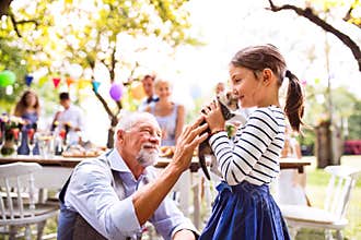 Family celebration or a garden party outside in the backyard.