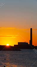 Dawn at power plant. UHD vertical wallpaper