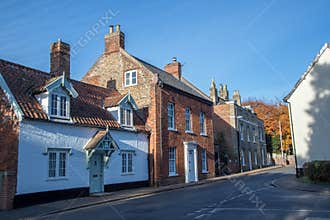 Old town houses in typical English village street. Wymondham UK.