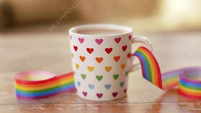 Cup of coffee with gay pride awareness ribbon