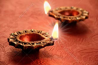 Two Beautiful Lit Diya for Diwali Celebrations