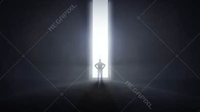 Opening wall with glowing light and man standing in front of it