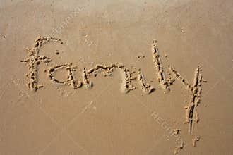 Family in the sand