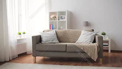 Sofa with cushions at cozy home living room