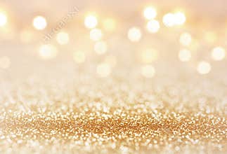 Golden color abstract glitter texture background for holidays