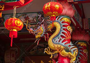 Golden dragon statue in old chinese temple, Mae Sot, Tak Province, western Thailand