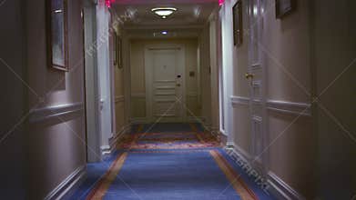 Point of view walking on long corridor in luxury hotel or luxury mansion