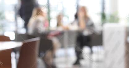 People in luxury restaurant, abstract blur