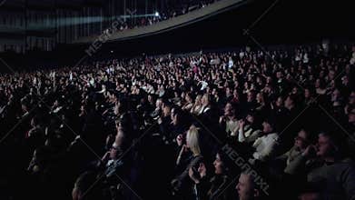 Audience watches the show