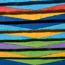 Close up of bright, patterned paintwork on house on the island of Burano, Venice, Italy