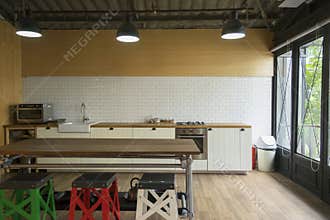 Corner of the white kitchen. The kitchen is decoration with whit