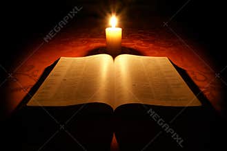 Bible and candle